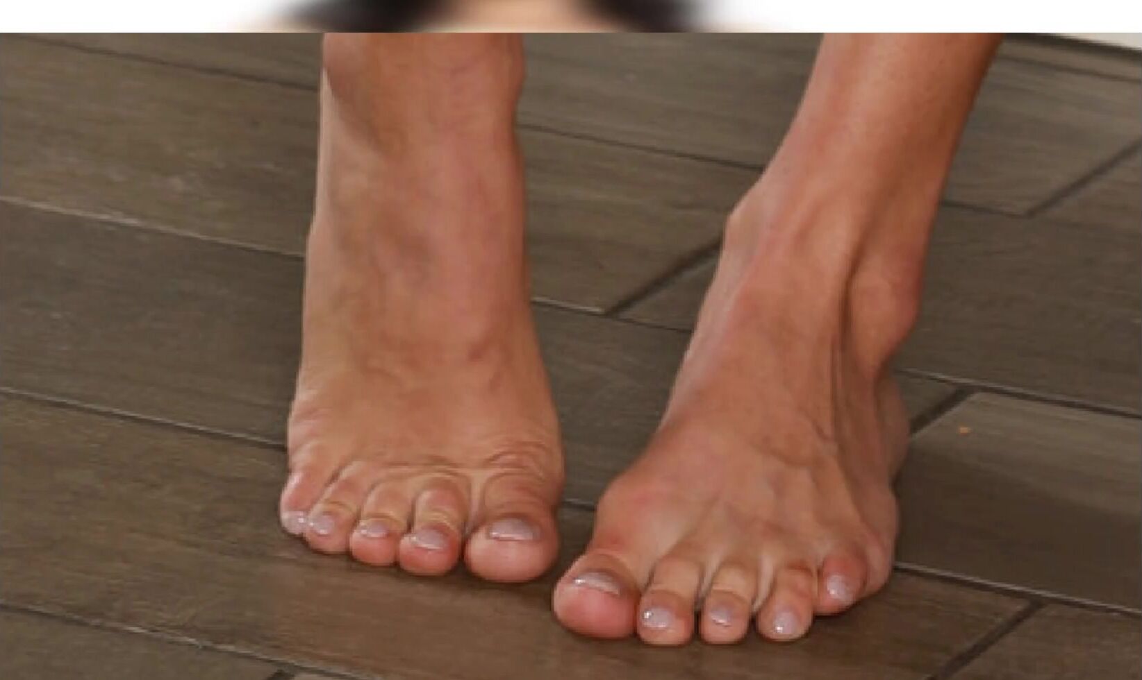 Emily Willis is showing her lovely feet and toes in this slideshow -  FootPorno.com